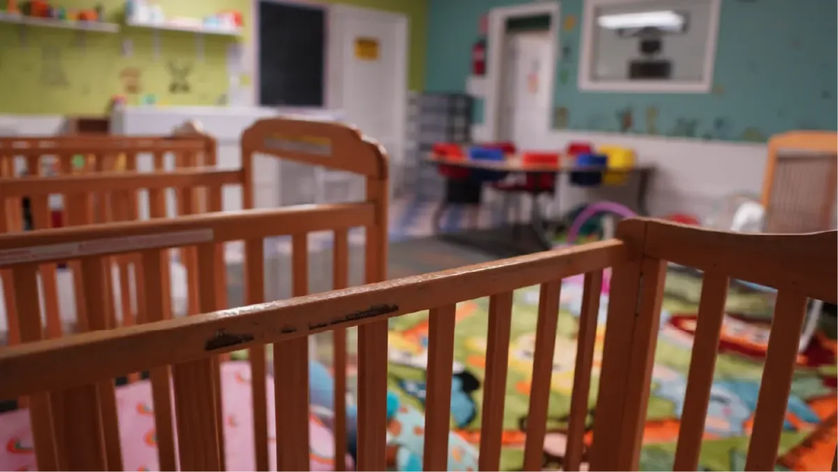 The calm infant nap room with cribs